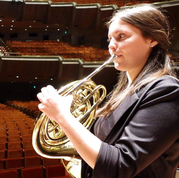 melissa headshot melissa playing a french horn
